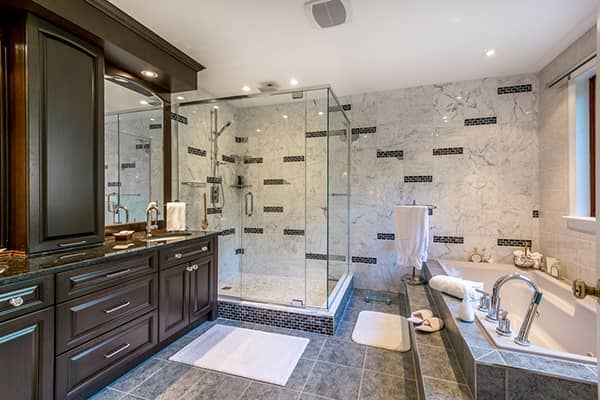 Before and after of a bathroom remodeling project in Agoura Hills showing complete transformation