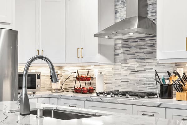 Before and after of a kitchen remodeling project in Agoura Hills showing layout transformation